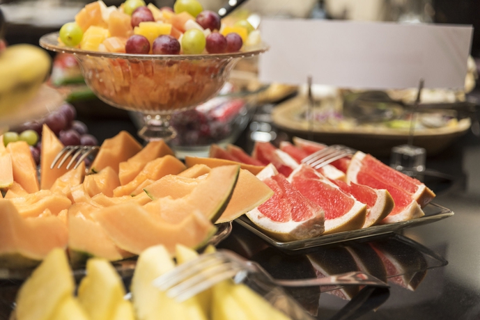 Imagen del bar/restaurante del Hotel Carat Boutique. Foto 8