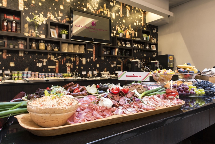 Imagen del bar/restaurante del Hotel Carat Boutique. Foto 9