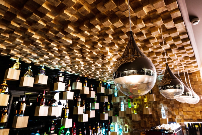 Imagen del bar/restaurante del Hotel Carat. Foto 2