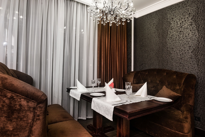 Imagen del bar/restaurante del Hotel Carat. Foto 3