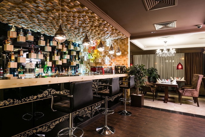 Imagen del bar/restaurante del Hotel Carat. Foto 4