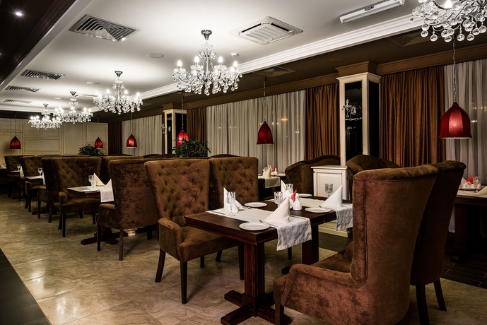 Imagen del bar/restaurante del Hotel Carat. Foto 5