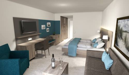 Imagen de la habitación del Hotel Carat Golf and Sporthotel. Foto 6