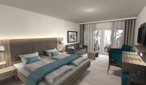 Imagen de la habitación del Hotel Carat Golf and Sporthotel. Foto 7