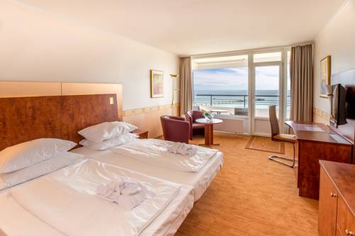 Imagen de la habitación del Hotel Carat Golf and Sporthotel. Foto 10