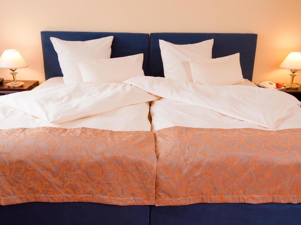 Imagen de la habitación del Hotel Carathotel Basel. Foto 9