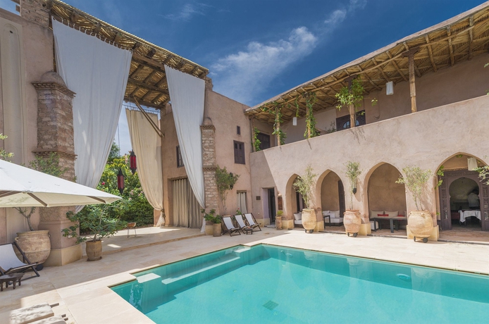 Imagen de la piscina del Hotel Caravan Serai. Foto 11