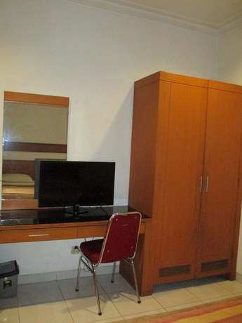 Imagen de la habitación del Hotel Caravan, Yakarta. Foto 8