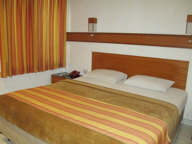 Imagen de la habitación del Hotel Caravan, Yakarta. Foto 10