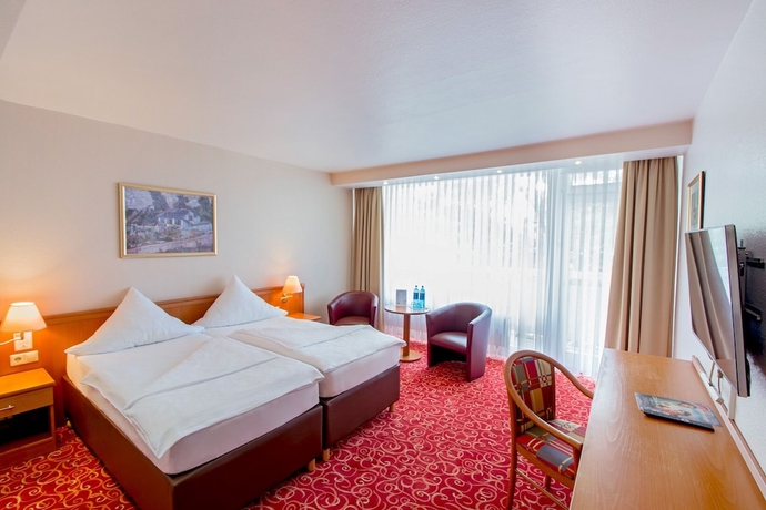 Imagen de la habitación del Hotel Caravelle Im Park. Foto 7