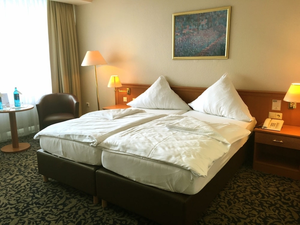 Imagen de la habitación del Hotel Caravelle Im Park. Foto 9