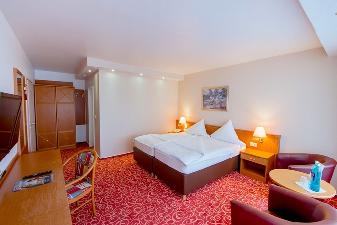 Imagen de la habitación del Hotel Caravelle Im Park. Foto 11