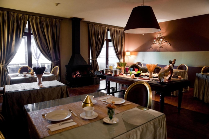 Imagen del bar/restaurante del Hotel Cardamomo Sigüenza. Foto 4