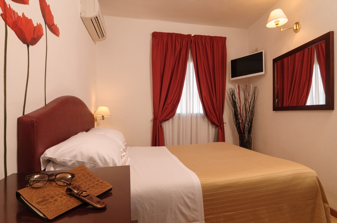 Imagen de la habitación del Hotel Cardinal Of Florence. Foto 9