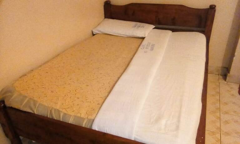 Imagen de la habitación del Hotel Care Guest House. Foto 11