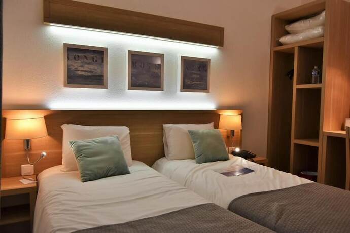 Imagen de la habitación del Hotel Carentan. Foto 16