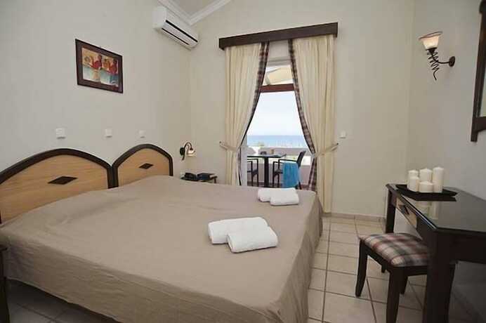 Imagen de la habitación del Hotel Caretta Beach. Foto 14