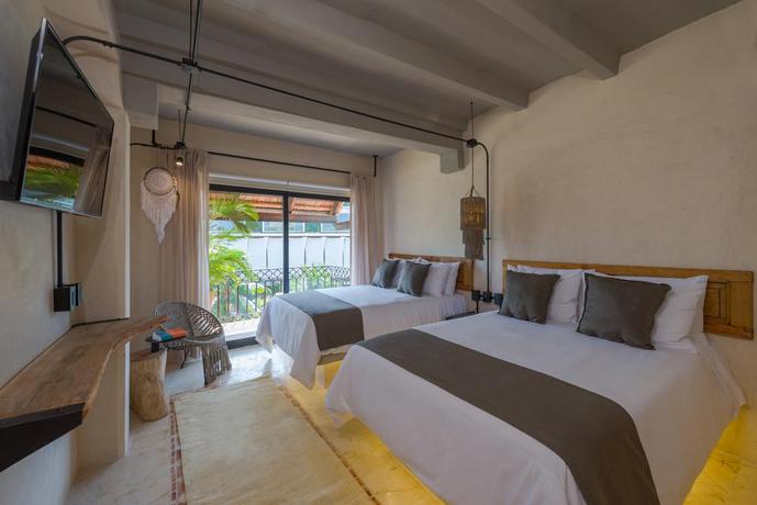 Imagen de la habitación del Hotel Caribbean Paradise Hotel Boutique and Spa By Paradise Hotels - 5th Av Playa Del Carmen. Foto 6