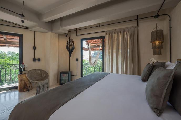 Imagen de la habitación del Hotel Caribbean Paradise Hotel Boutique and Spa By Paradise Hotels - 5th Av Playa Del Carmen. Foto 7