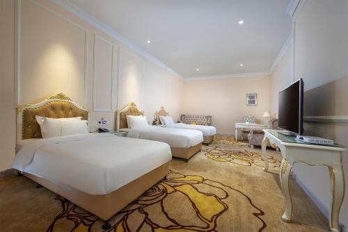 Imagen de la habitación del Hotel Caribbean Zhongshan. Foto 17