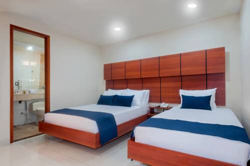 Imagen de la habitación del Hotel Caribe 79. Foto 4