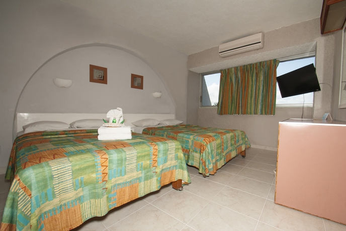 Imagen de la habitación del Hotel Caribe Internacional. Foto 6