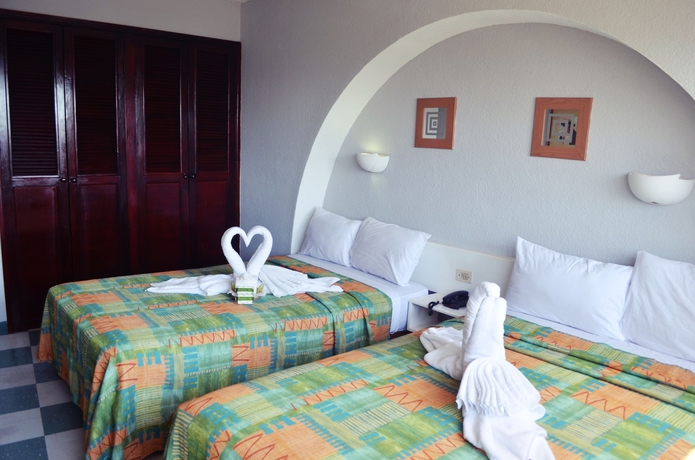 Imagen de la habitación del Hotel Caribe Internacional. Foto 8