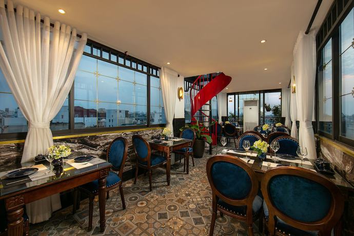 Imagen del bar/restaurante del Hotel Carillon Boutique. Foto 4