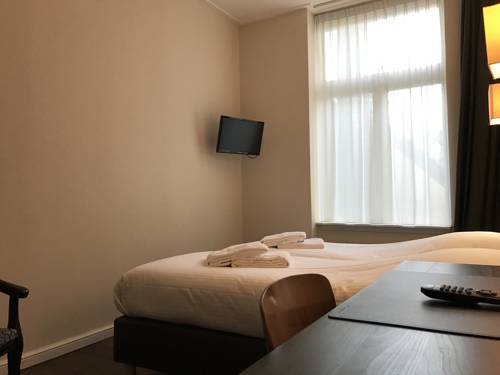 Imagen de la habitación del Hotel Carillon, Haarlem. Foto 3