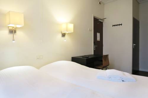 Imagen de la habitación del Hotel Carillon, Haarlem. Foto 6