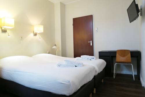 Imagen de la habitación del Hotel Carillon, Haarlem. Foto 8