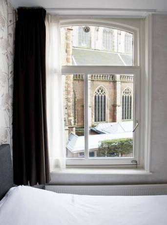 Imagen de la habitación del Hotel Carillon, Haarlem. Foto 9