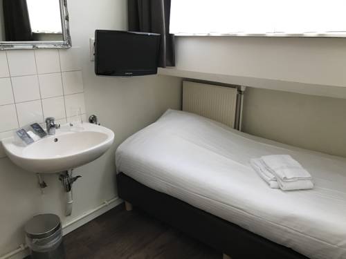 Imagen de la habitación del Hotel Carillon, Haarlem. Foto 11