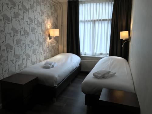 Imagen de la habitación del Hotel Carillon, Haarlem. Foto 12