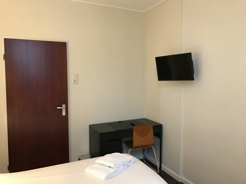 Imagen de la habitación del Hotel Carillon, Haarlem. Foto 13