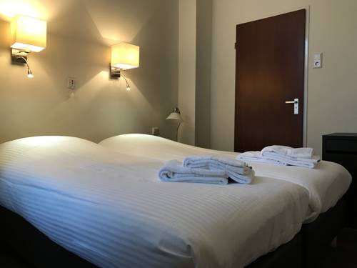 Imagen de la habitación del Hotel Carillon, Haarlem. Foto 14