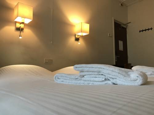 Imagen de la habitación del Hotel Carillon, Haarlem. Foto 16