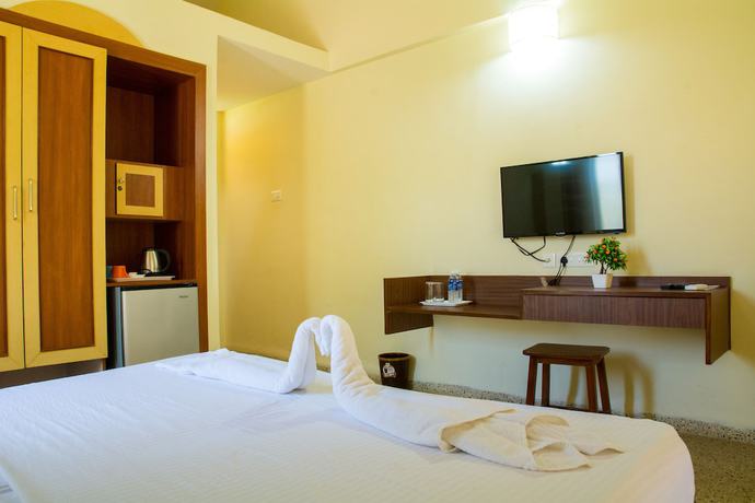 Imagen de la habitación del Hotel Carina Beach Resort. Foto 7