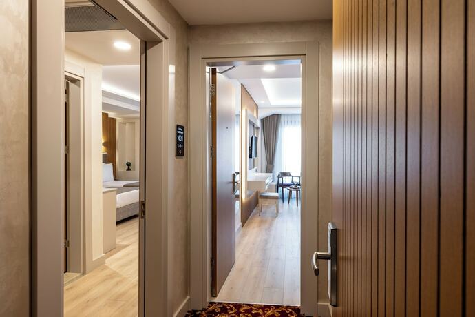 Imagen de la habitación del Hotel Carina Gold. Foto 14