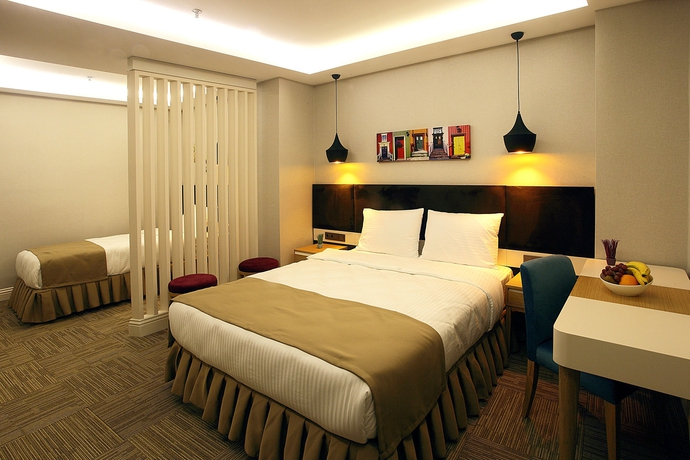Imagen de la habitación del Hotel Carina Park Suites Nisantasi. Foto 12
