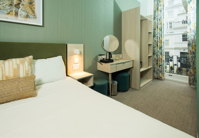 Imagen de la habitación del Hotel Caring. Foto 3