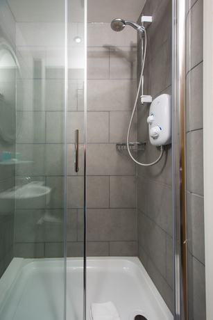 Imagen de la habitación del Hotel Caring. Foto 4