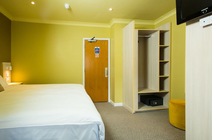 Imagen de la habitación del Hotel Caring. Foto 5