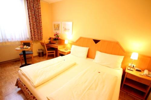 Imagen de la habitación del Hotel Carinthia Stadthotel. Foto 42