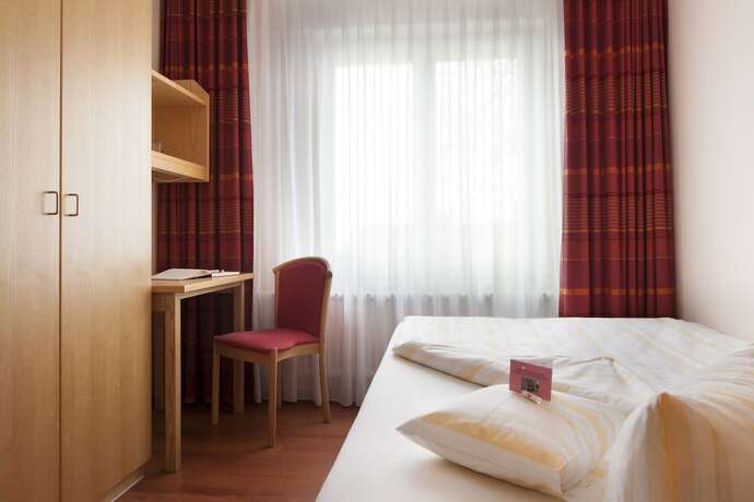 Imagen de la habitación del Hotel Caritas Tagungszentrum. Foto 19