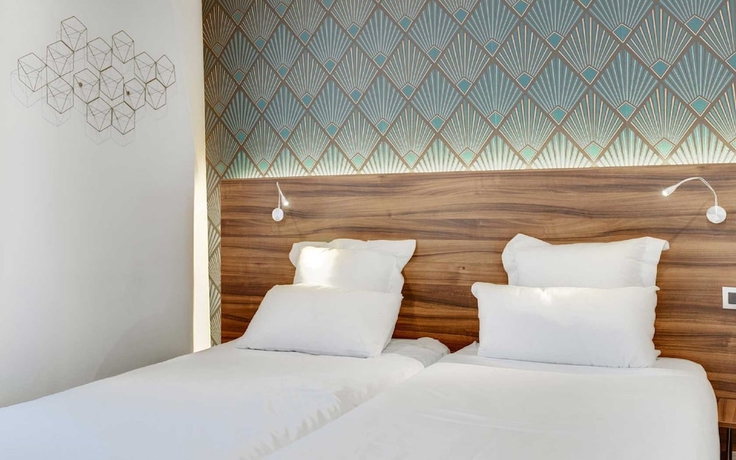 Imagen de la habitación del Hotel Carladez Cambronne. Foto 4