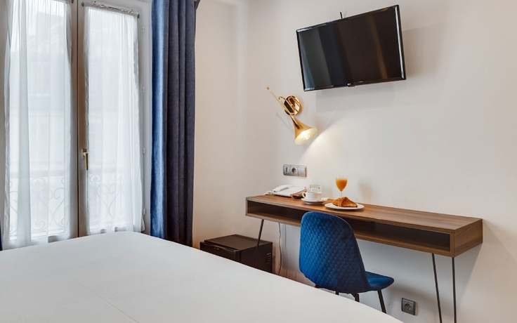 Imagen de la habitación del Hotel Carladez Cambronne. Foto 13