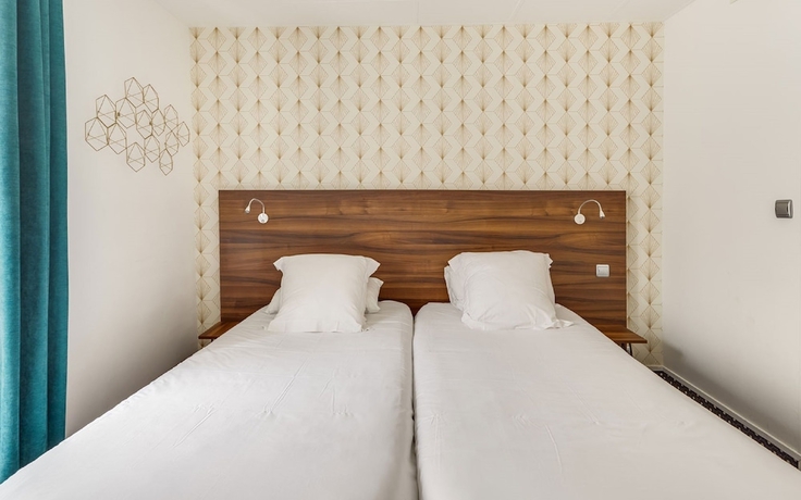 Imagen de la habitación del Hotel Carladez Cambronne. Foto 14