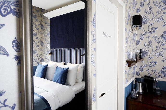 Imagen de la habitación del Hotel Carlton Ambassador. Foto 14