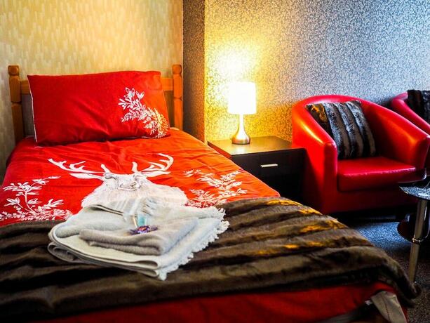 Imagen de la habitación del Hotel Carlton House. Foto 13